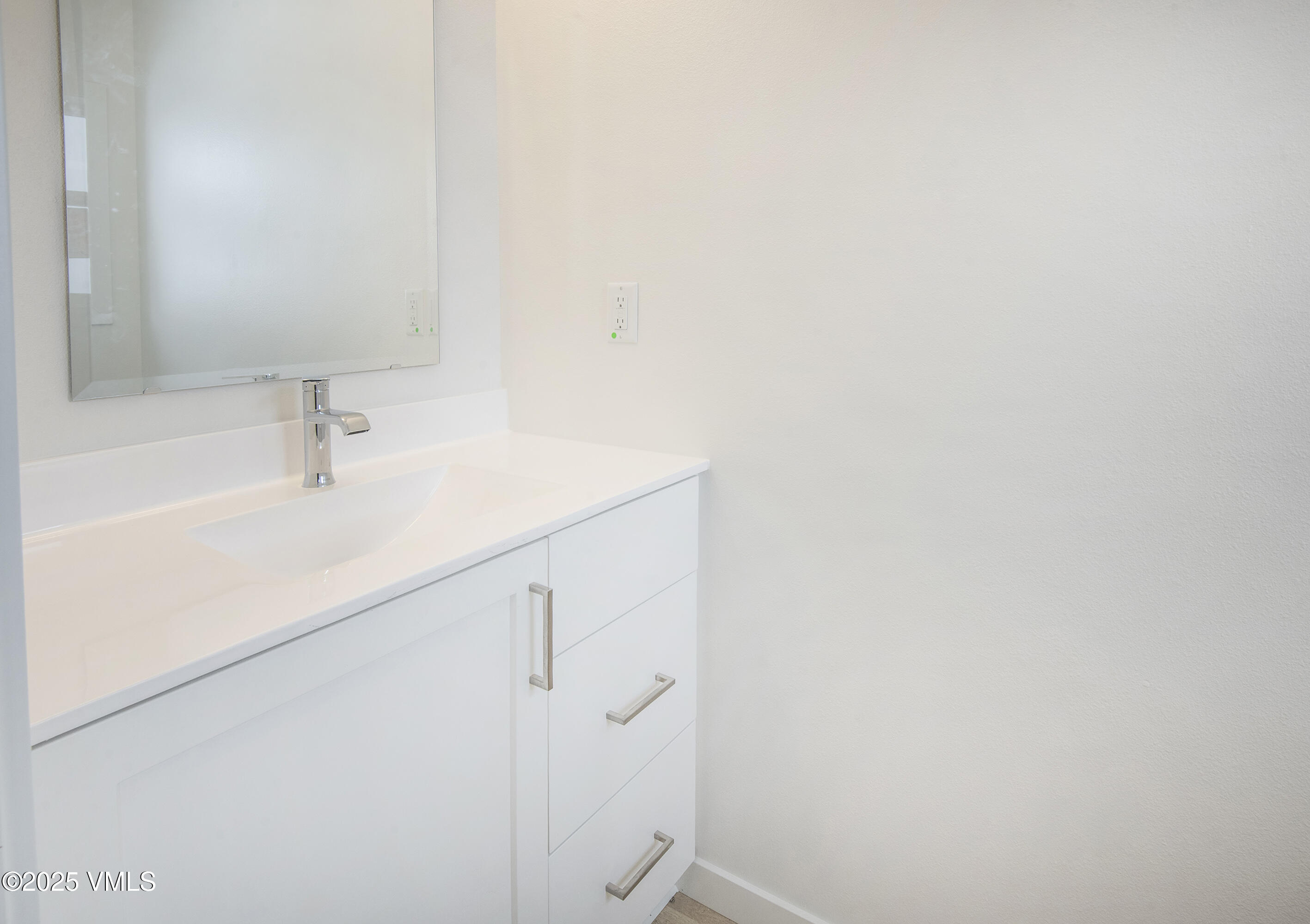 70 Comanche Way Gypsum, CO 81637 - Photo 14 of 46 a bathroom with a sink and vanity