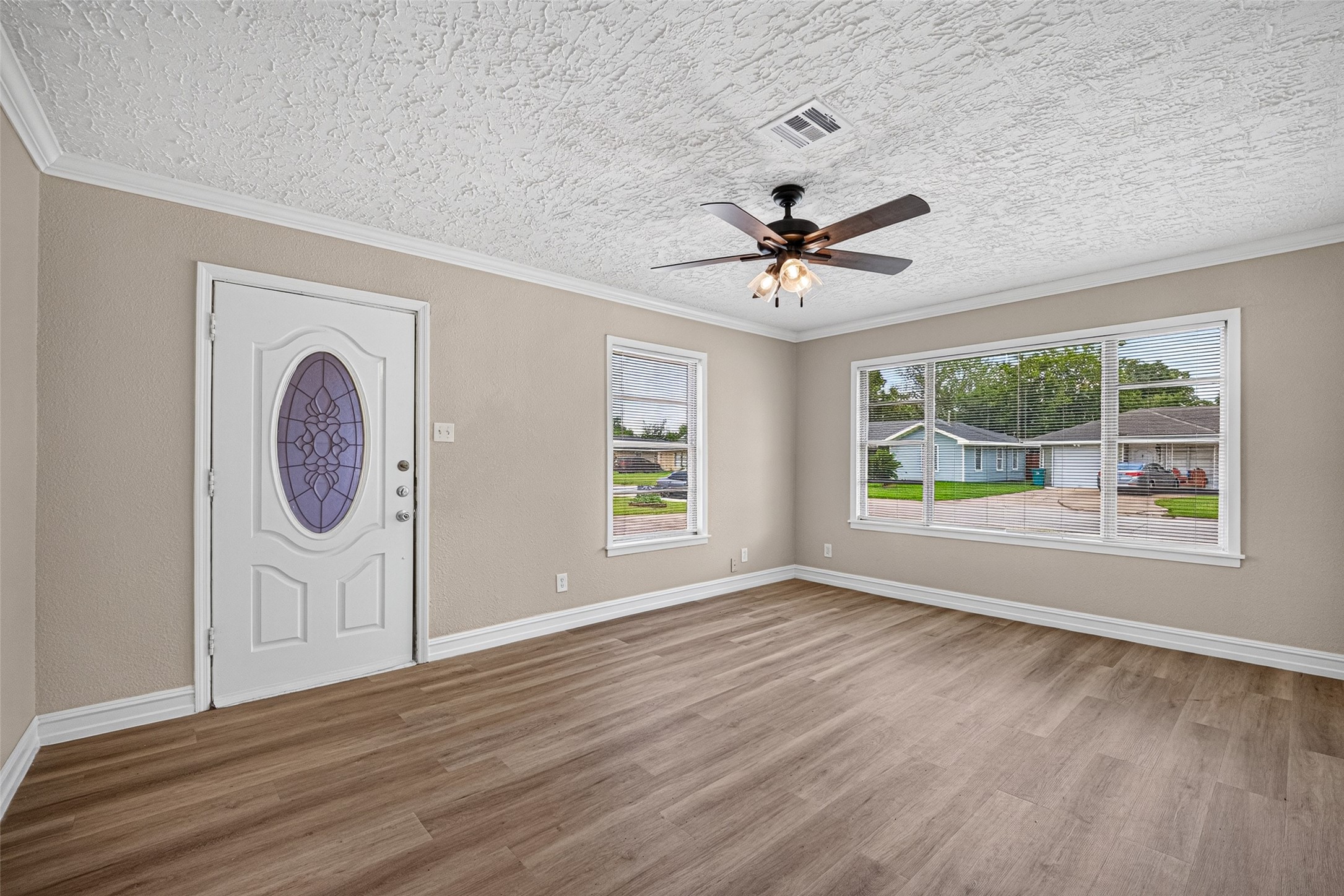 3218 Grant Street Pasadena, TX 77503 - Photo 4 of 26 Plenty of light here in the living area and new floors.