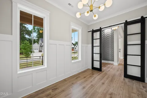 a view of a livingroom with furniture and window