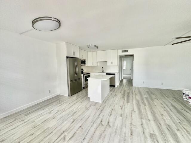 478 Fanshaw L Boca Raton, FL 33434 - Photo 5 of 26 Open Living Area