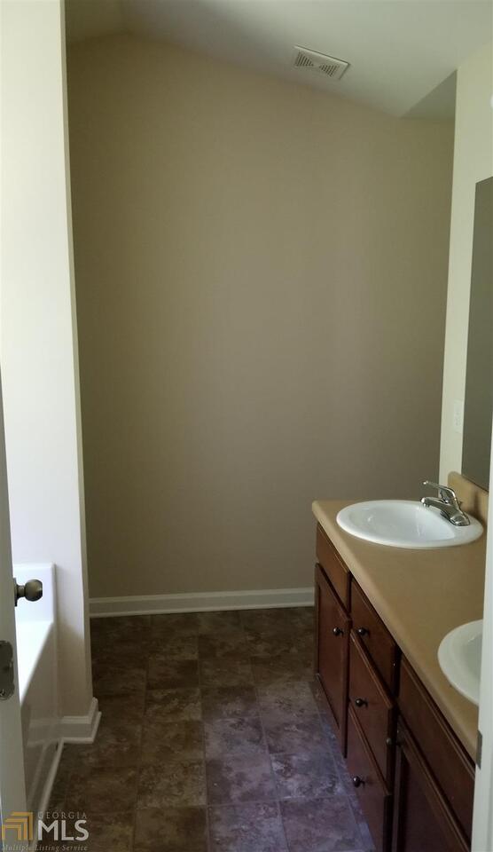 2441 Capella Circle Southwest Atlanta, GA 30331 - Photo 11 of 12 a bathroom with a sink and a vanity
