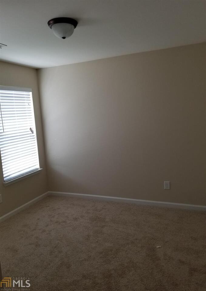 2441 Capella Circle Southwest Atlanta, GA 30331 - Photo 12 of 12 an empty room with a window