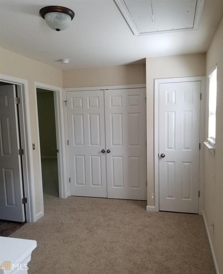 2441 Capella Circle Southwest Atlanta, GA 30331 - Photo 7 of 12 an empty room with closet area