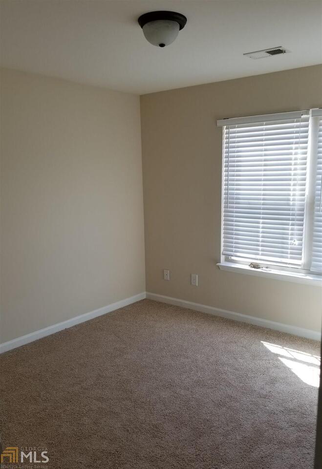 2441 Capella Circle Southwest Atlanta, GA 30331 - Photo 10 of 12 an empty room with a window