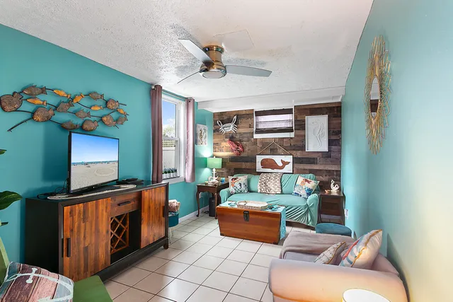 a kitchen with stainless steel appliances granite countertop a stove and a refrigerator