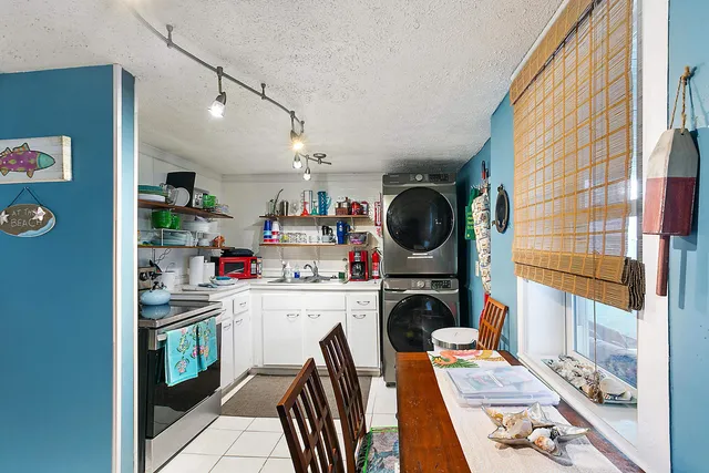 a view of a dining room with furniture window and carpet