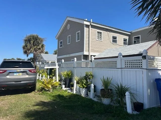 a view of a house with a garden