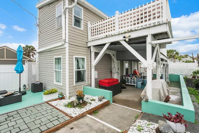 a front view of a house with patio