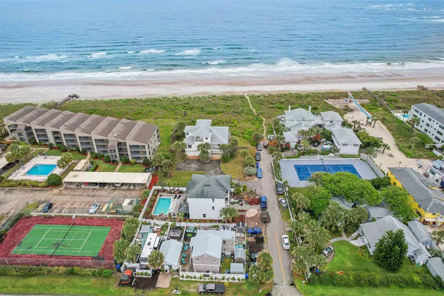 a view of outdoor space with swimming pool and lake view