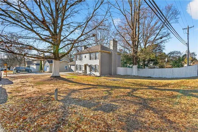 a view of a house with snow on the side of the house