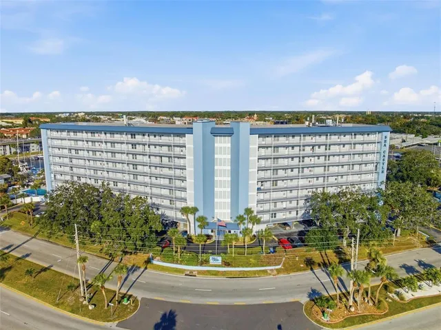 a view of swimming pool from a balcony