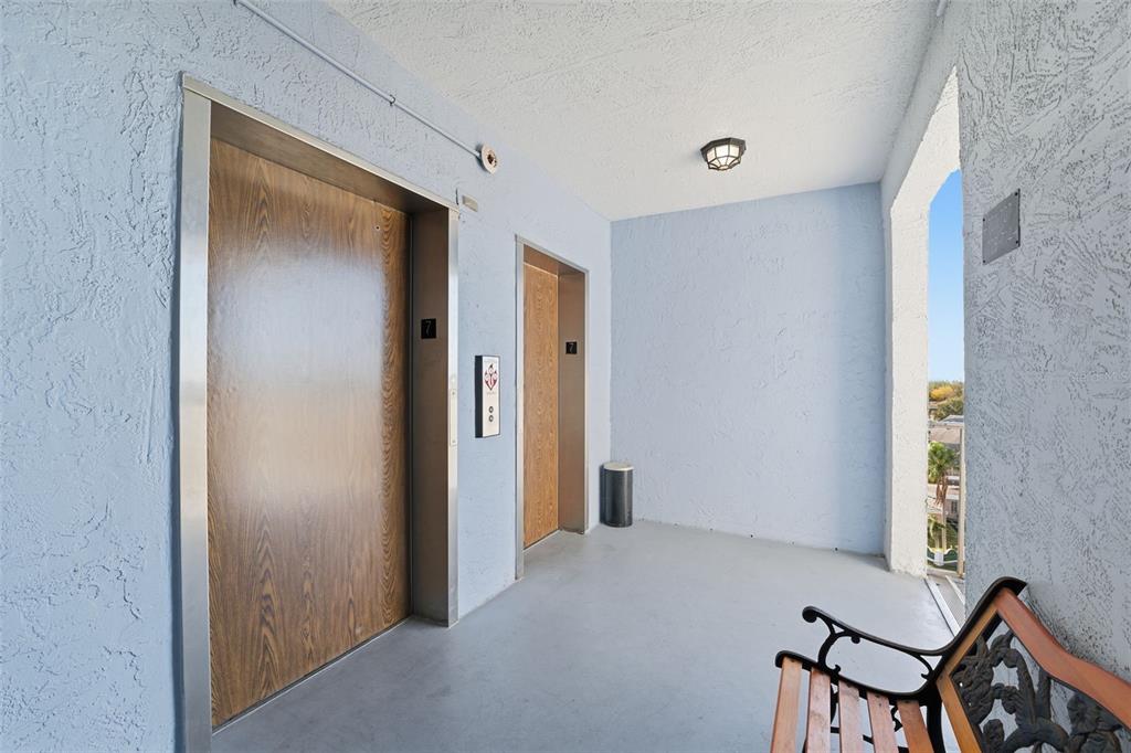 4939 Floramar Terrace, Unit 712 New Port Richey, FL 34652 - Photo 28 of 41 a view of a room with furniture and a window