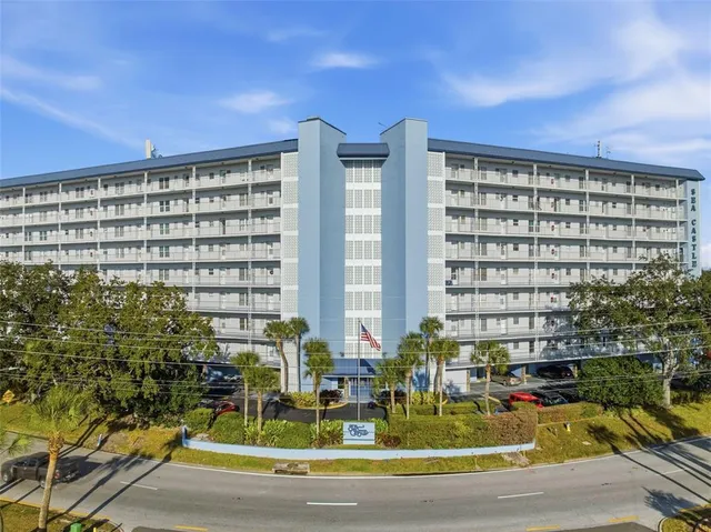 a view of swimming pool with outdoor seating