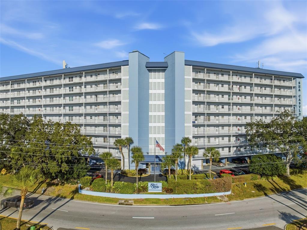 4939 Floramar Terrace, Unit 712 New Port Richey, FL 34652 - Photo 32 of 41 a view of swimming pool with outdoor seating