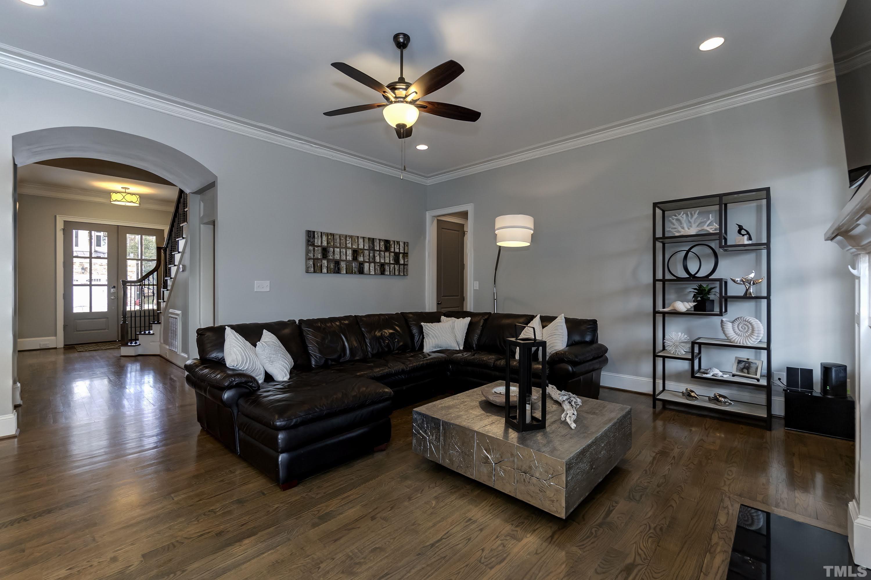 6418 Rosny Road Raleigh, NC 27613 - Photo 22 of 52 a living room with furniture and a large window