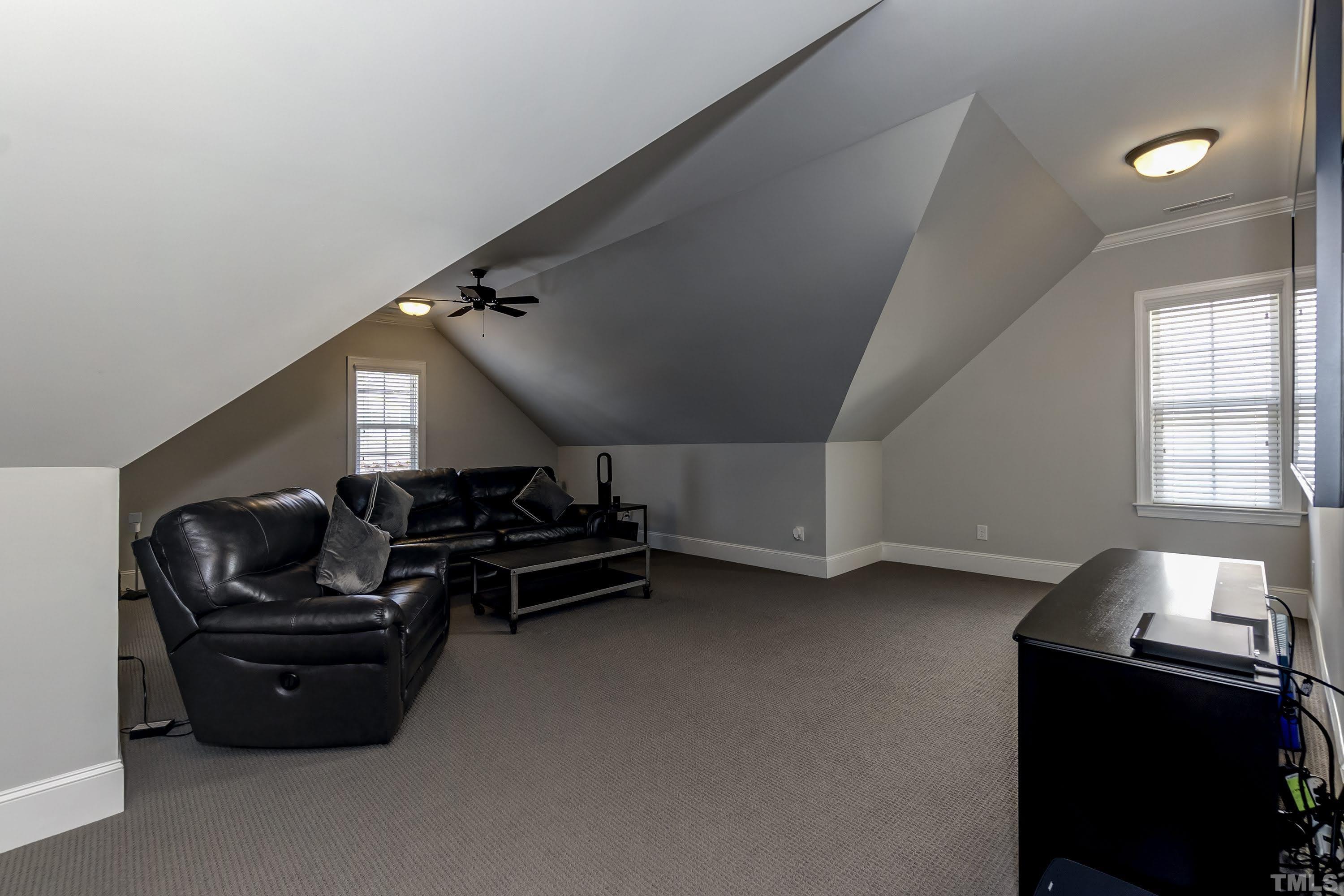 6418 Rosny Road Raleigh, NC 27613 - Photo 40 of 52 a living room with furniture