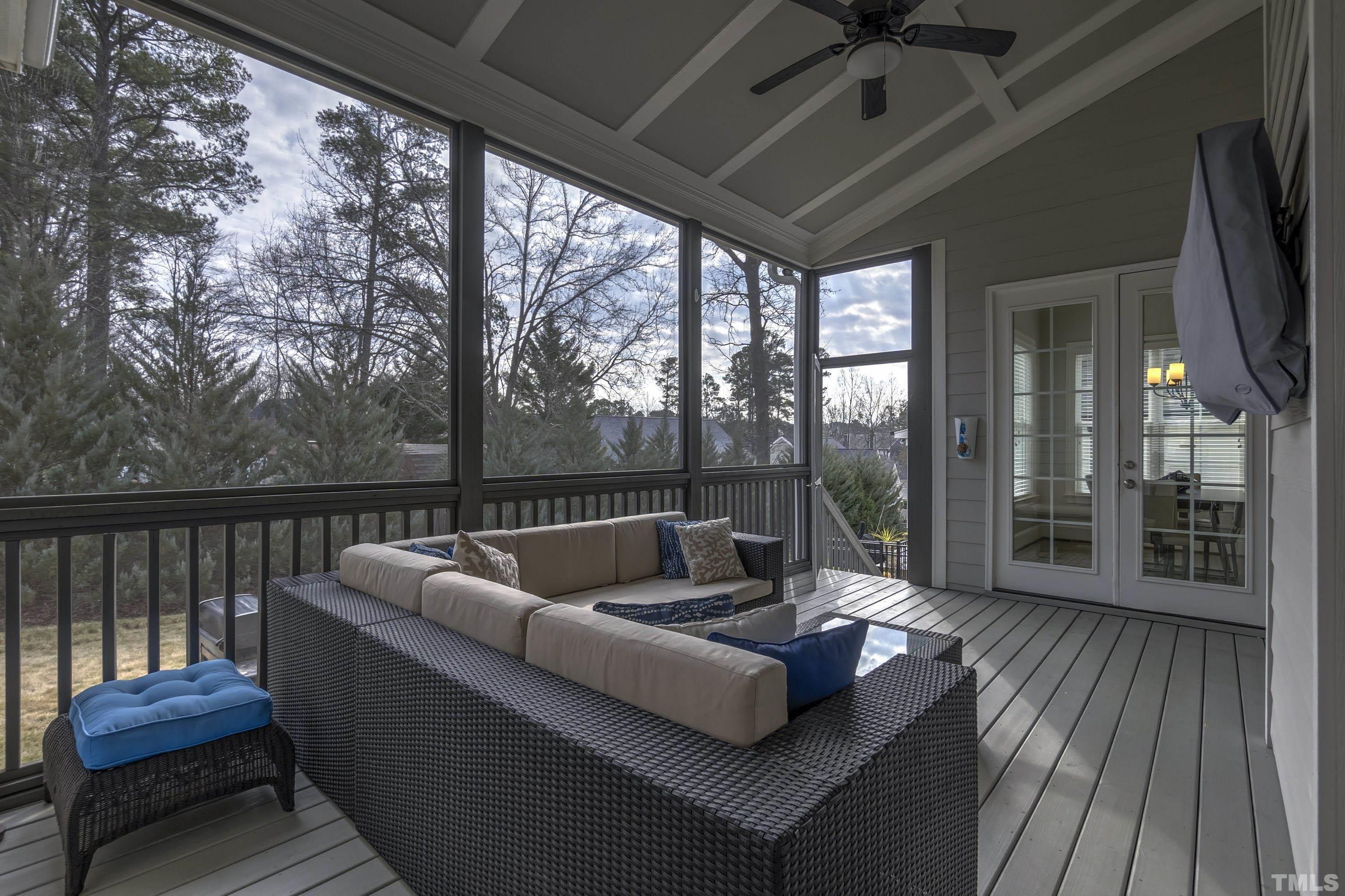 6418 Rosny Road Raleigh, NC 27613 - Photo 42 of 52 a balcony with couch and outdoor space