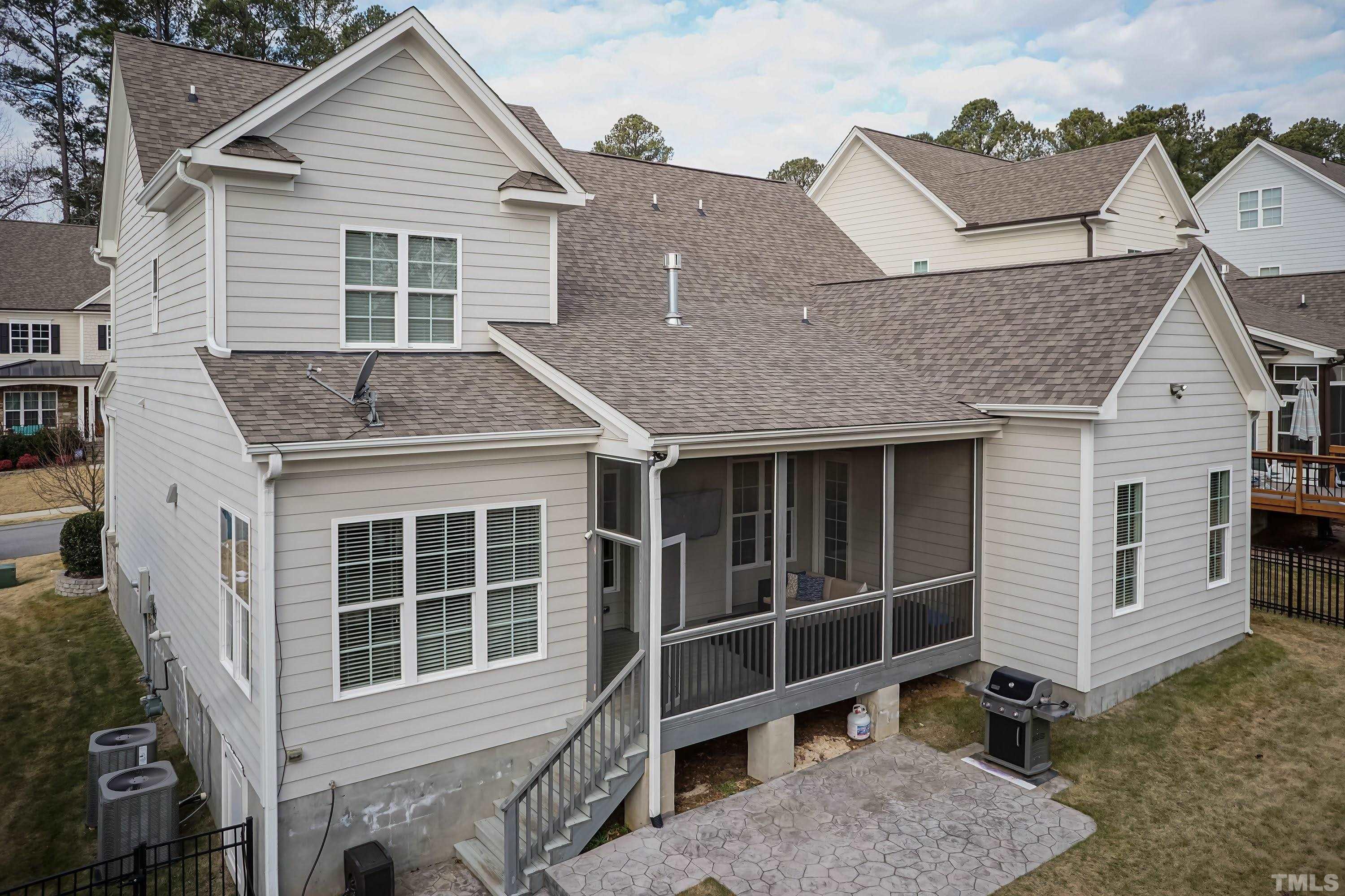6418 Rosny Road Raleigh, NC 27613 - Photo 45 of 52 a front view of a house with a yard