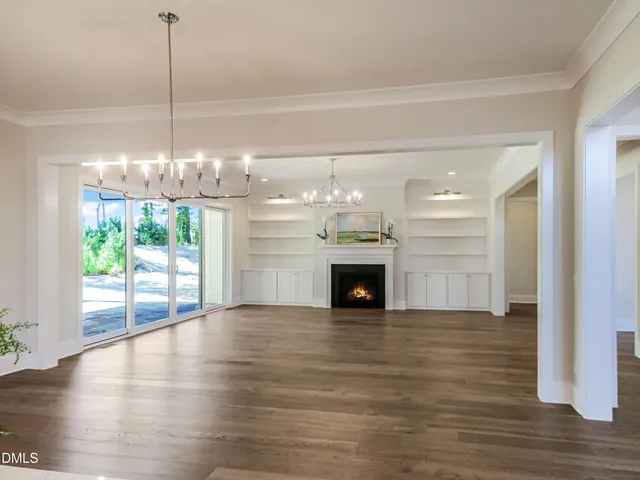 a kitchen with granite countertop a sink stainless steel appliances and cabinets