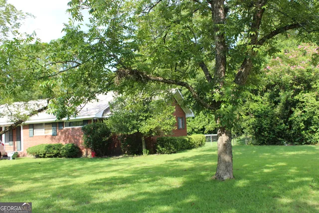 a view of a backyard with a garden