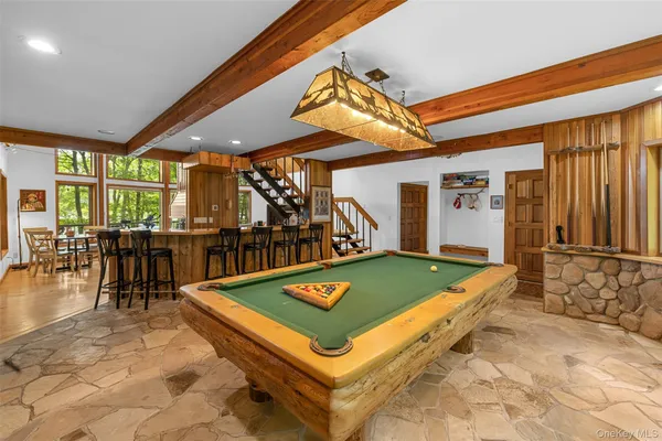 a room with lots of tables and chairs