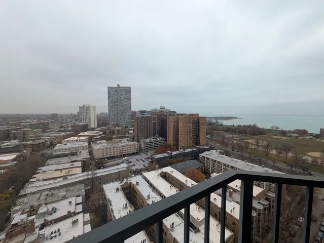 a view of a city skyline from a balcony