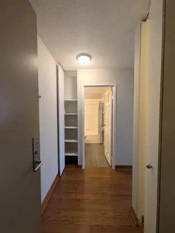a bathroom with a double vanity sink toilet mirror and bathtub
