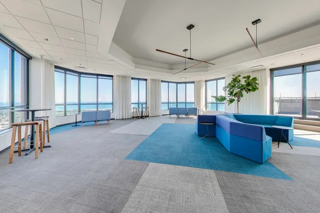 a kitchen with stainless steel appliances granite countertop a stove and a refrigerator