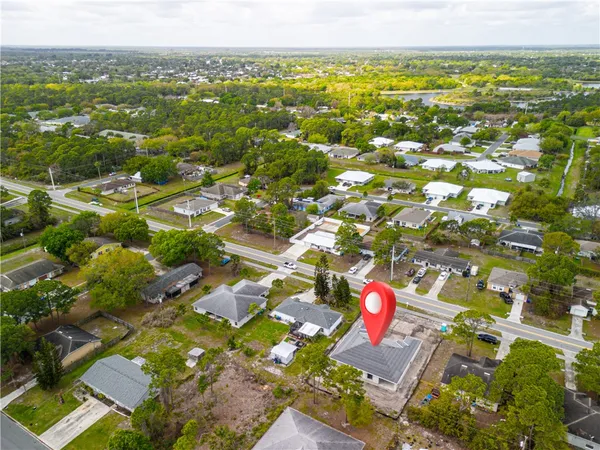 a view of city with ocean