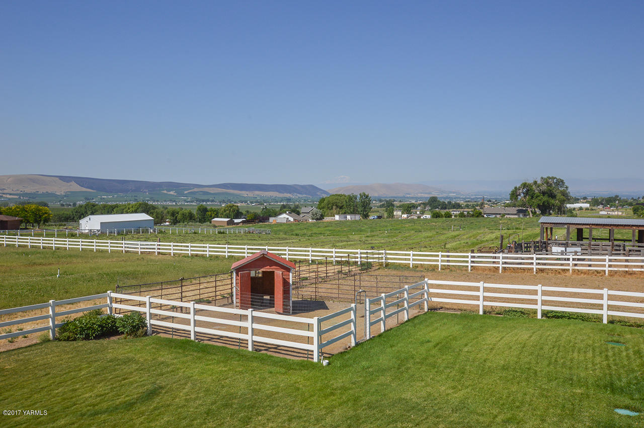10820 Mieras Road Yakima, WA 98901 - Photo 17 of 21 a view of a lake with a big yard