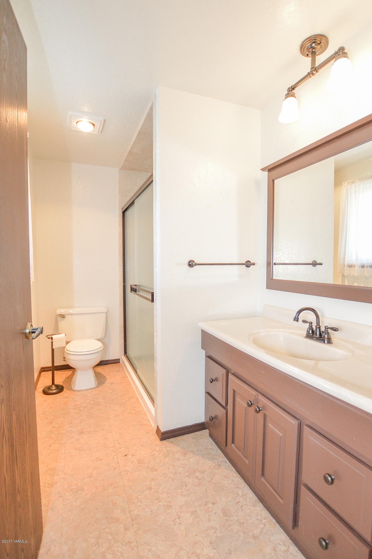10820 Mieras Road Yakima, WA 98901 - Photo 6 of 21 a spacious bathroom with a double vanity sink mirror and