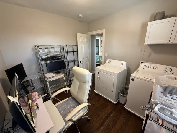 a room with furniture washer and dryer