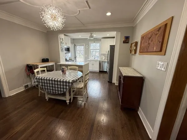 a bedroom with furniture and window