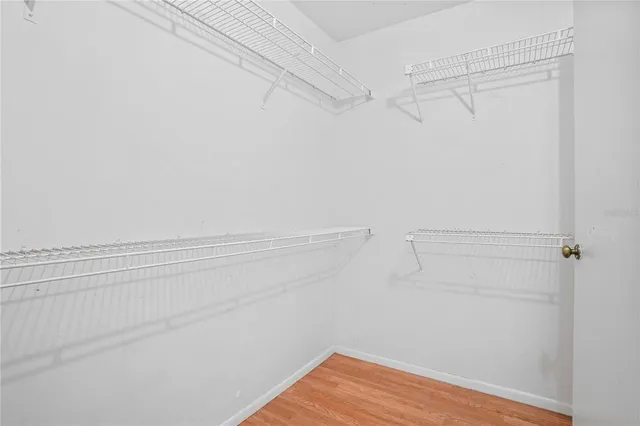 a view of a room with racks on the wall