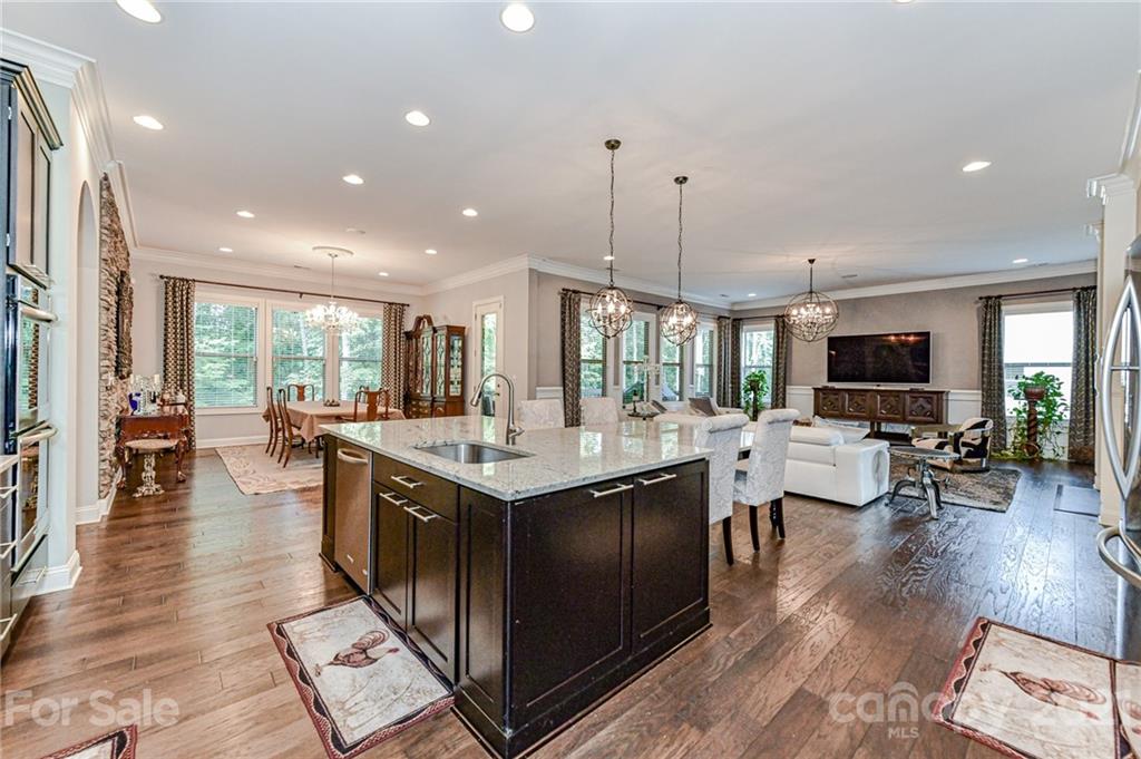 2756 Collaroy Road Waxhaw, NC 28173 - Photo 11 of 48 a large kitchen with a large center island in it