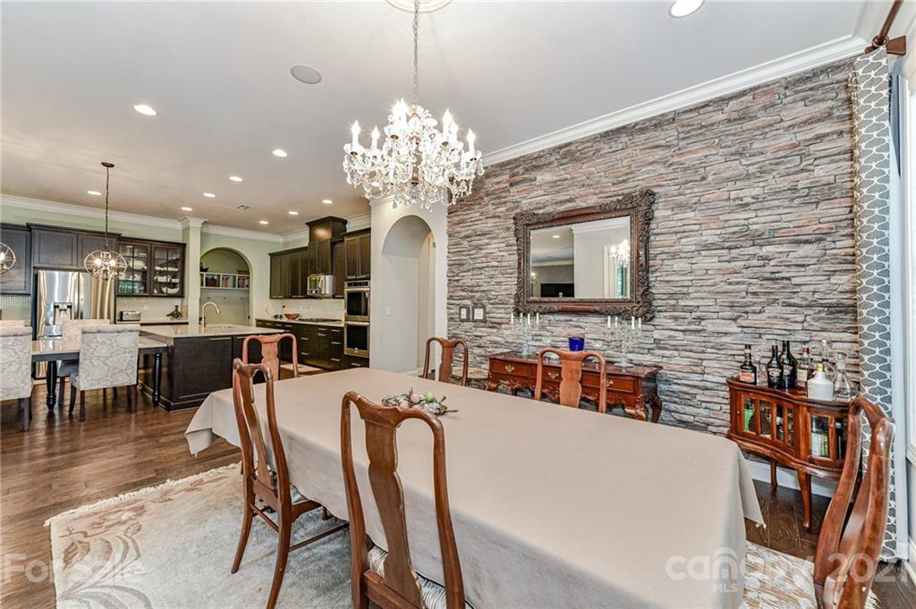 2756 Collaroy Road Waxhaw, NC 28173 - Photo 14 of 48 a view of a dining room with furniture