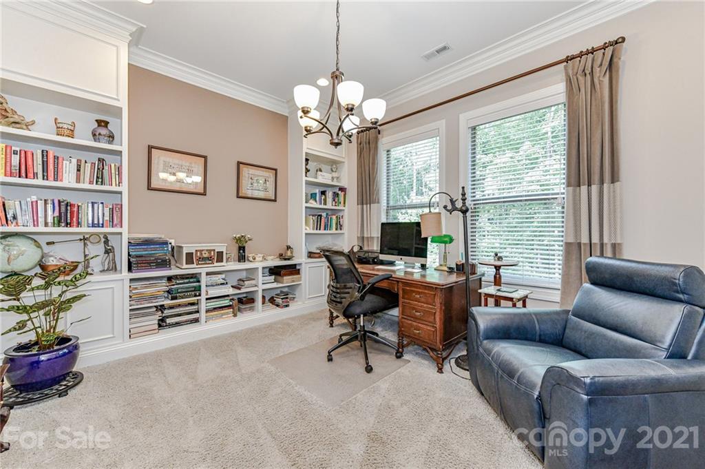 2756 Collaroy Road Waxhaw, NC 28173 - Photo 16 of 48 a view of a livingroom with furniture window and wooden floor