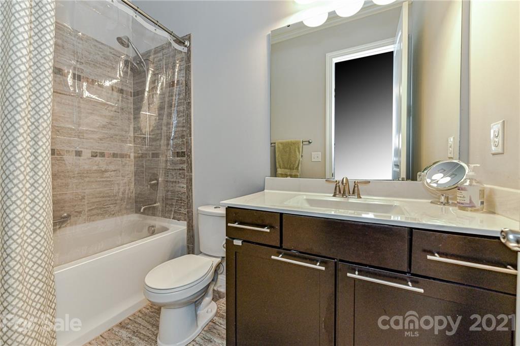 2756 Collaroy Road Waxhaw, NC 28173 - Photo 18 of 48 a bathroom with a sink a toilet and shower