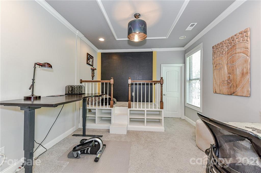 2756 Collaroy Road Waxhaw, NC 28173 - Photo 23 of 48 a view of a room with gym equipment