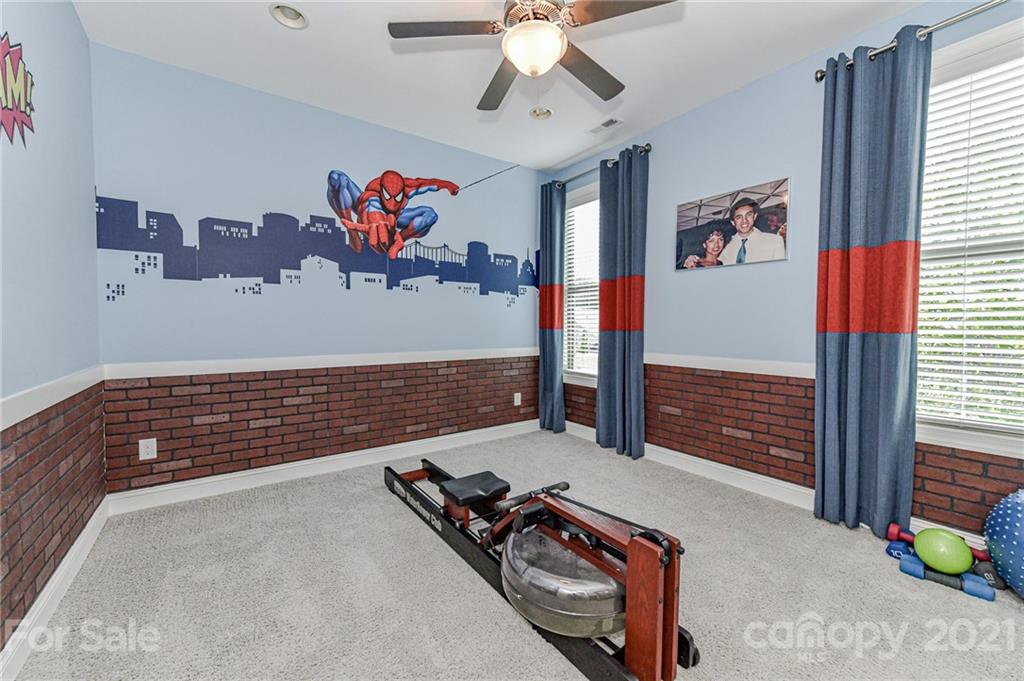 2756 Collaroy Road Waxhaw, NC 28173 - Photo 31 of 48 a view of a room with gym equipment