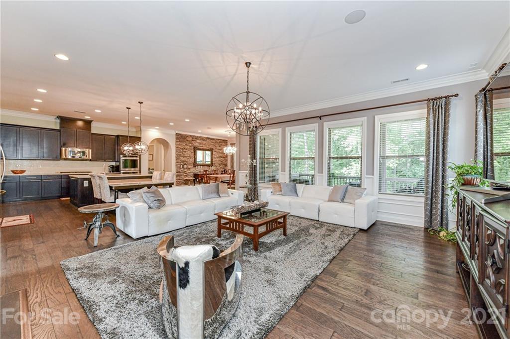 2756 Collaroy Road Waxhaw, NC 28173 - Photo 8 of 48 a living room with furniture and a chandelier