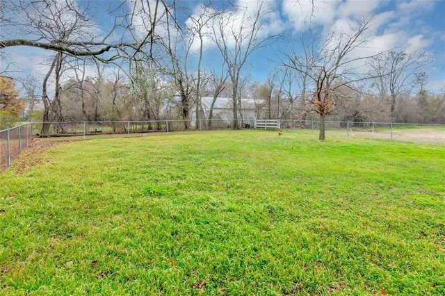 a view of a yard with an outdoor space