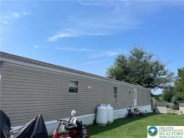 a view of a back yard of the house