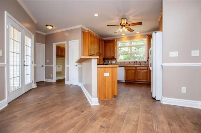 a bathroom with a sink a vanity and a mirror