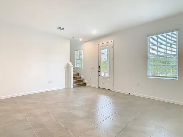 an empty room with windows