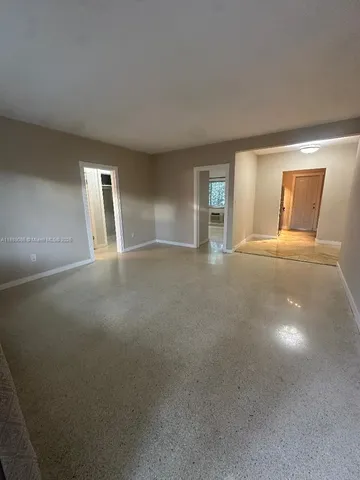 a view of a livingroom with a staircase