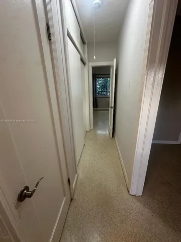 a view of hallway with stairs