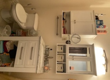 213 West Quincy Street, Unit 1 Riverside, IL 60546 - Photo 6 of 11 a bathroom with a sink and a mirror