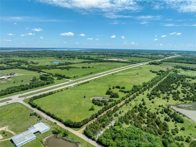 a view of a golf course with a swimming pool