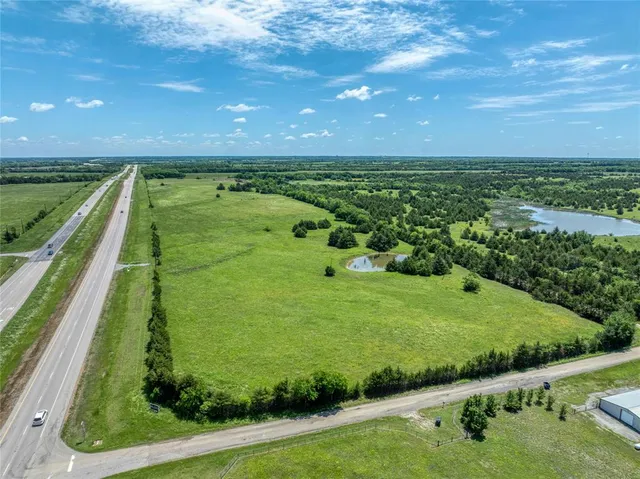 a view of a lush green space